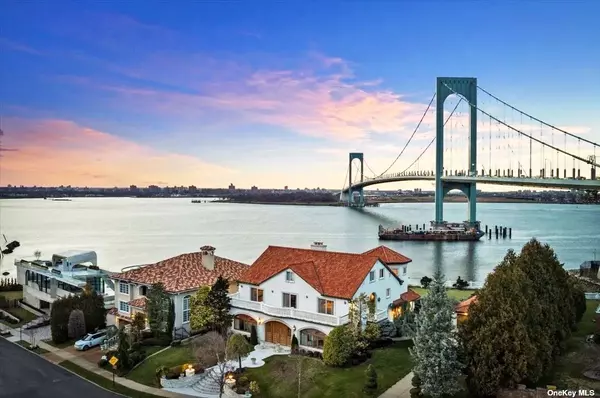 Malba-NY-aerial-waterfront-home-with-bridge-in-background