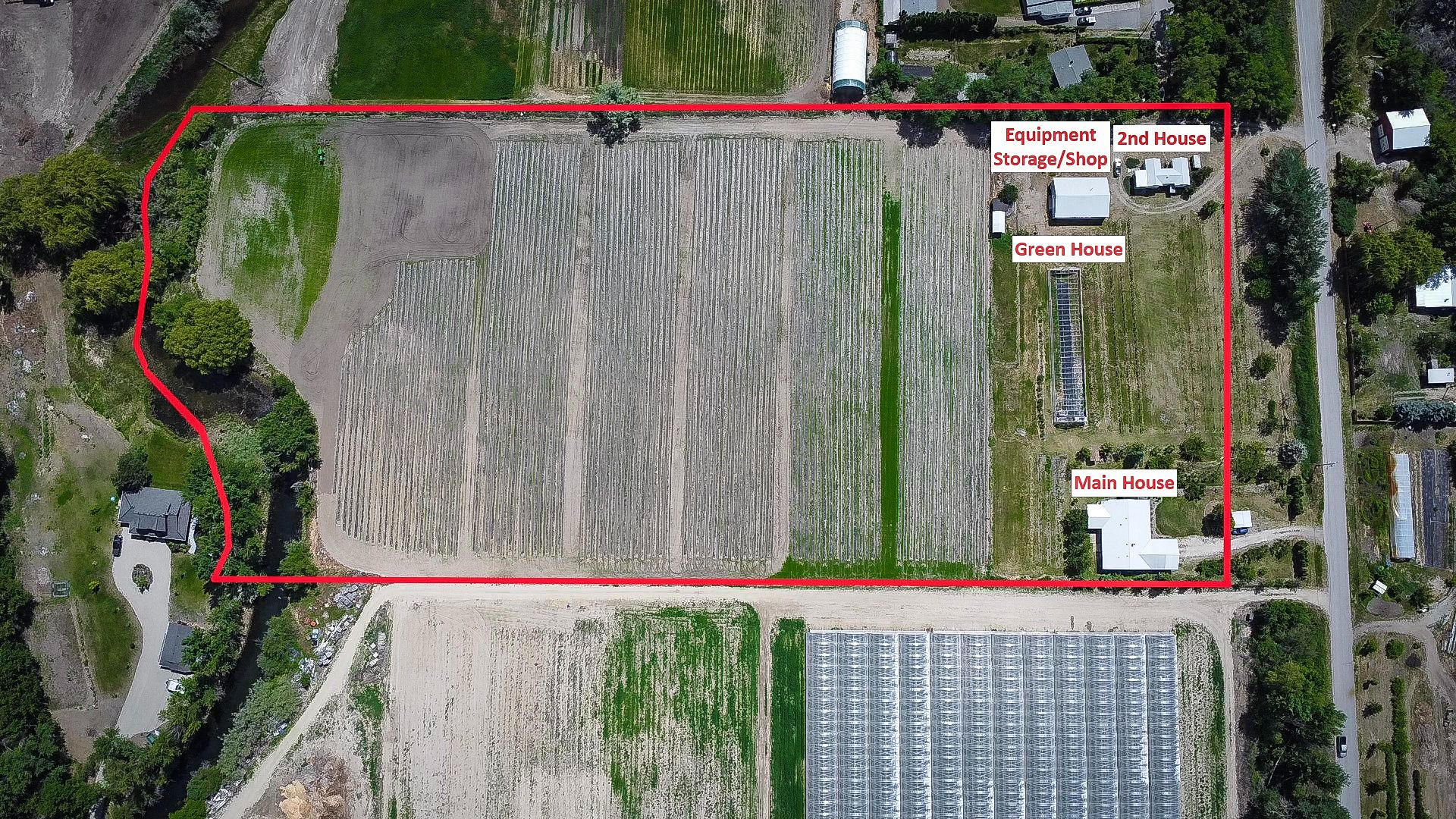 drone view of the farm at 7231 island rd, in oliver, bc 