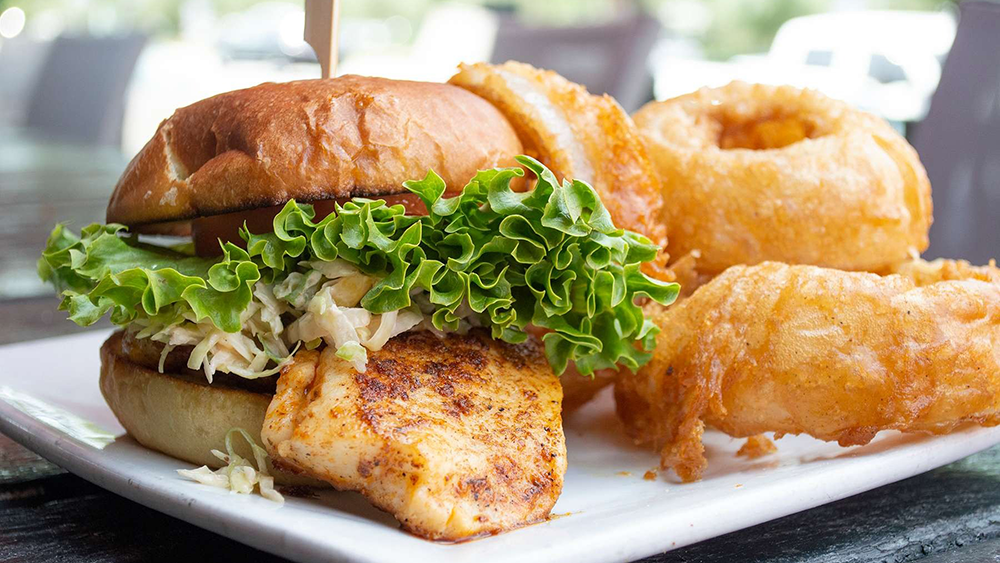 blackened fish sandwhich and onion rings from the shelter mount pleasant sc