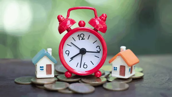 feature image of Worried About Timing The Sale Of Your Home With Buying A New One?