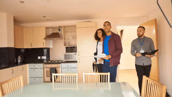 Leasing Agent touring potential tenants in the unit. Comprehensive leasing services in Niagara by Sherwin Mamaradlo at Engel & Völkers Niagara.