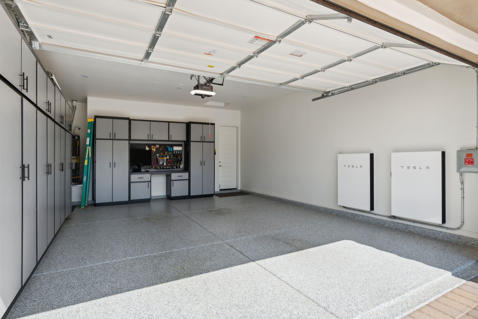 Roof equipped with 47 solar panels, part of an off-grid energy system in an eco-friendly Verrado home.