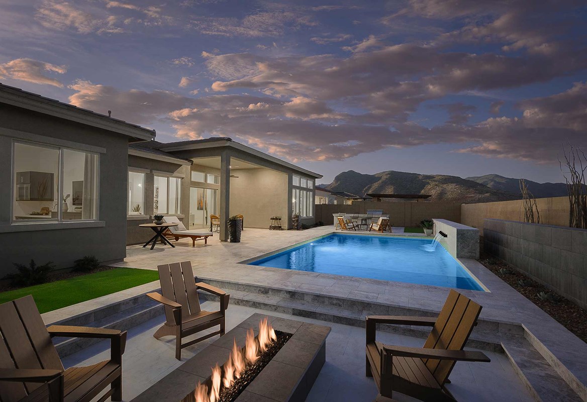 Family-friendly model home in Harvest, Queen Creek, AZ by David Weekley Homes, with spacious backyard and contemporary architecture.