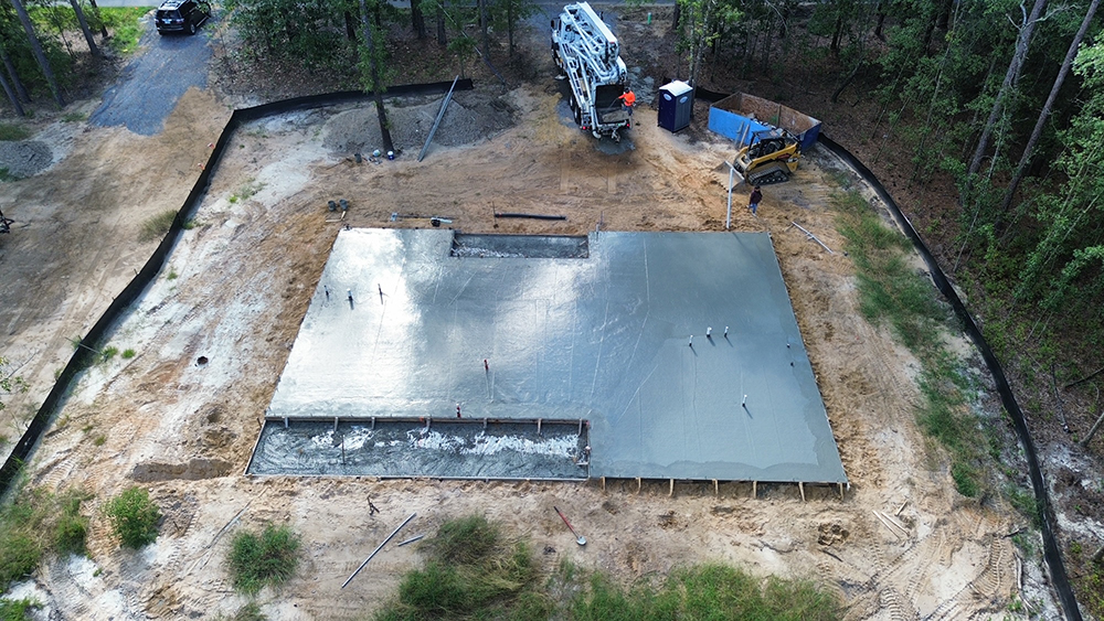 concrete foundation pouring at new home construction