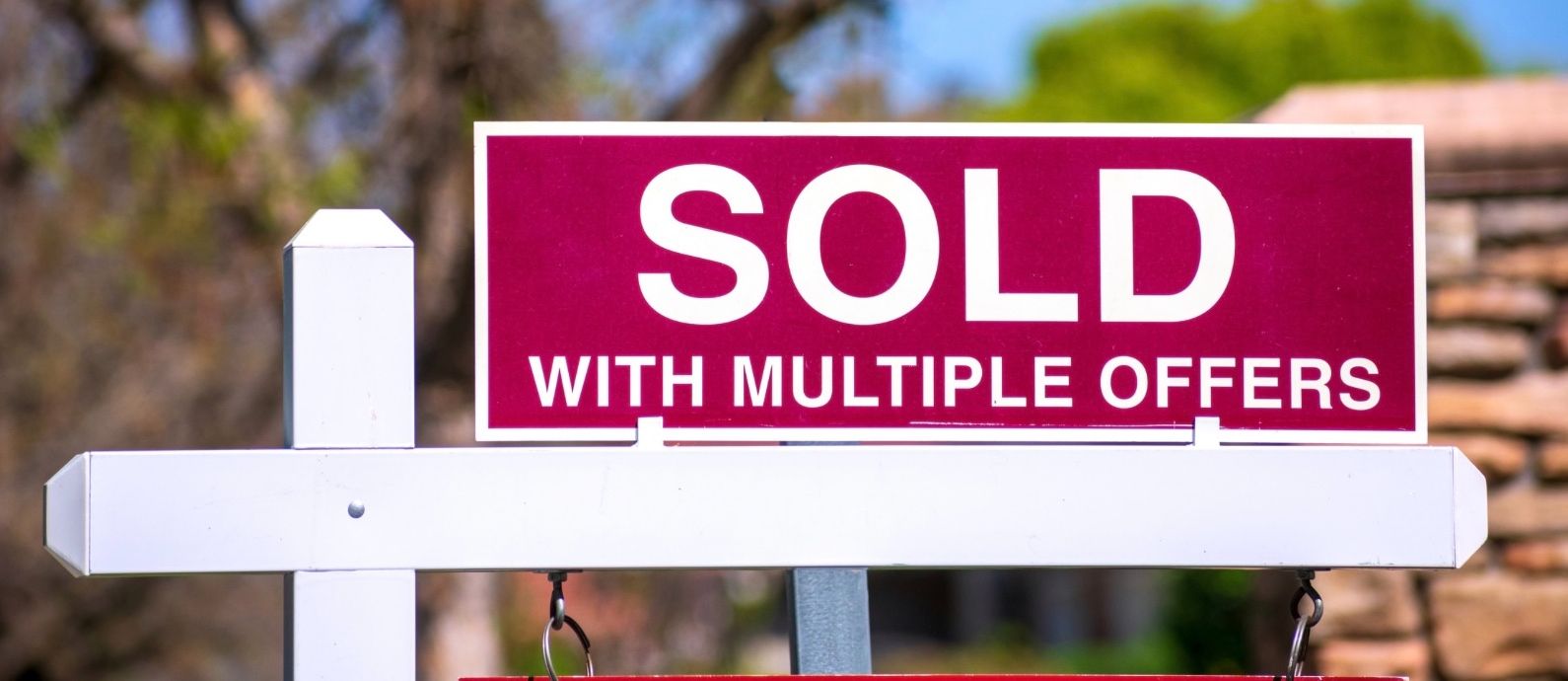 photo of a sold sign successfully sold with multiple offers by Evan Karam