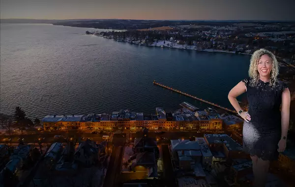 Skaneateles-aerial-lake-downtown-shops-lit-up-at-night-a