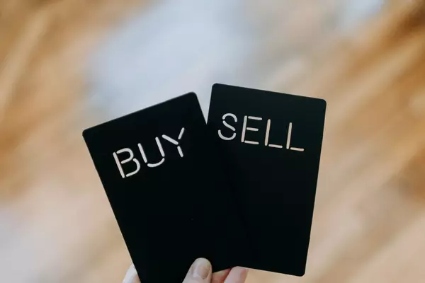 feature image of Buyer’s Market vs. Seller’s Market Explained: How to Win in Any Market Condition