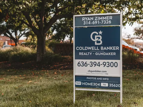 ryan zimmer's real estate sign for selling a home in st louis