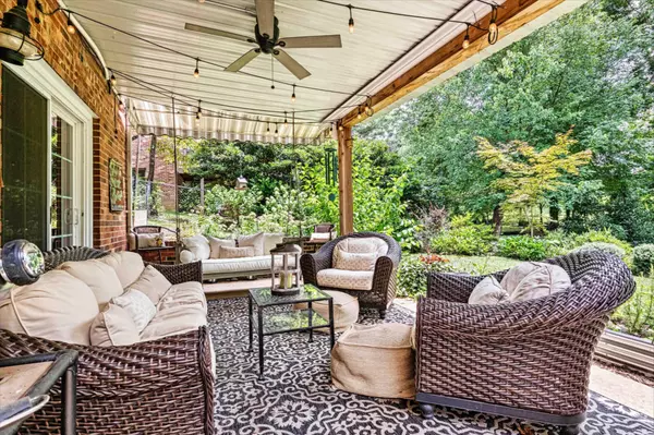 porch with wicker furniture and ceiling fan 1055 14th ave dr