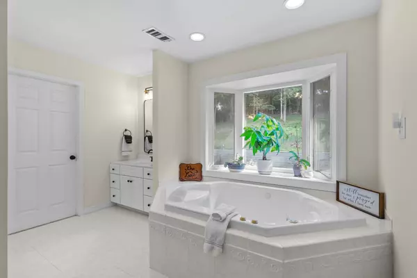 Master bathroom in st louis home with large soaker tub