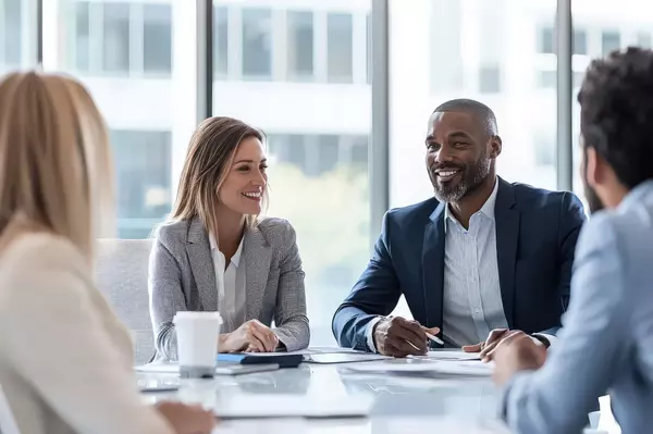 Group of People Collaborating at a Conference Table