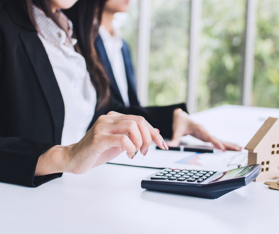 Home Buyer Financing - woman calculator house
