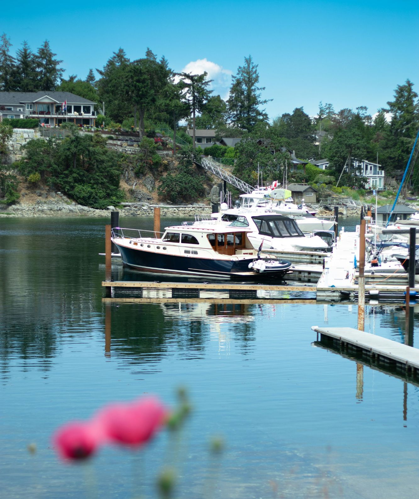 Schooner Cove Marina in Nanoose Bay, Vancouver Island, featuring luxury yachts, calm waterfront views, and oceanfront homes. A premier boating destination with coastal beauty and marina lifestyle.