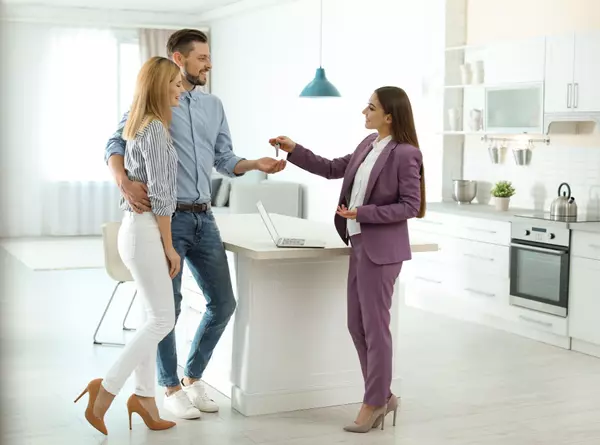 Couple in Kitchen getting keys
