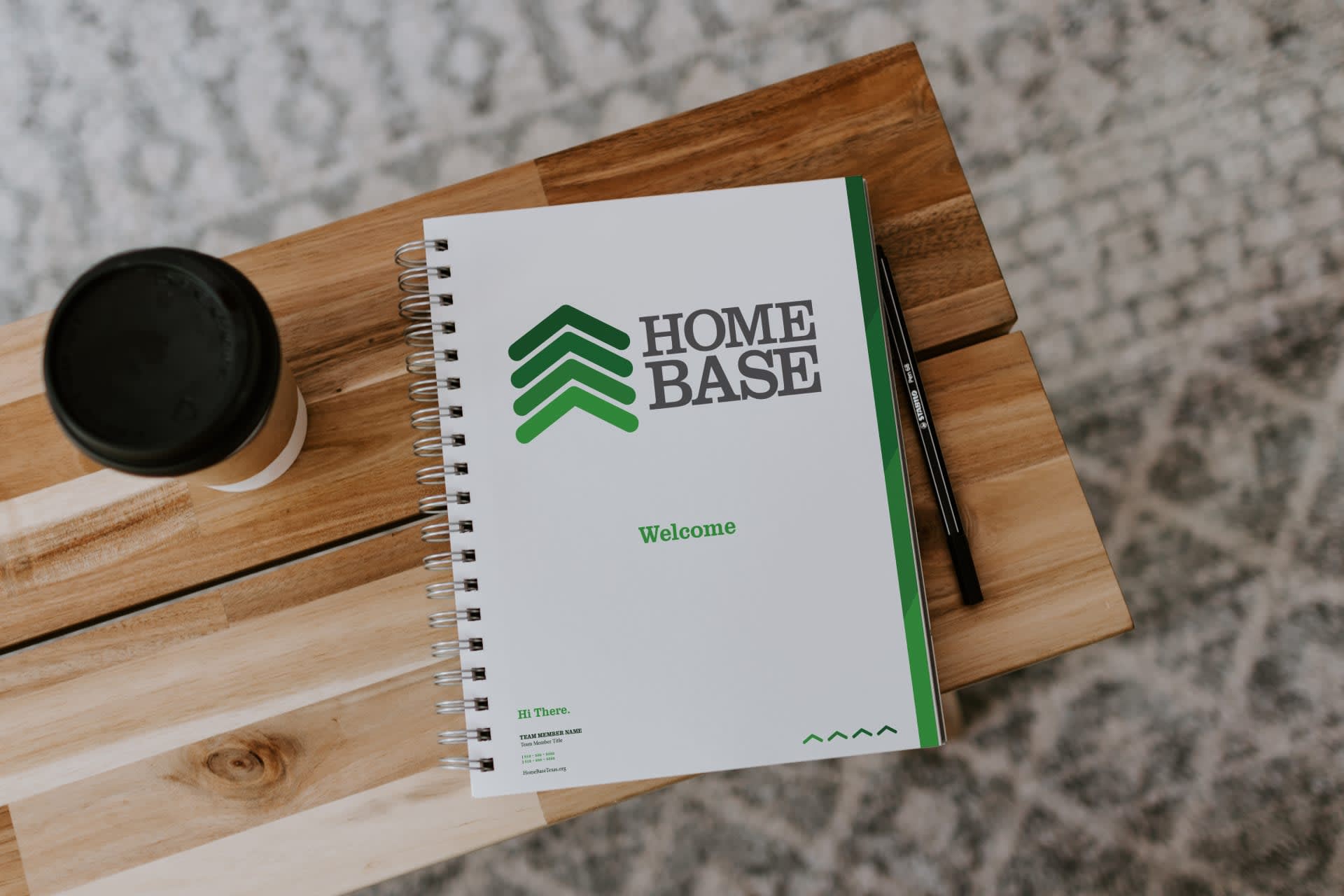 Image of a notebook with a logo.