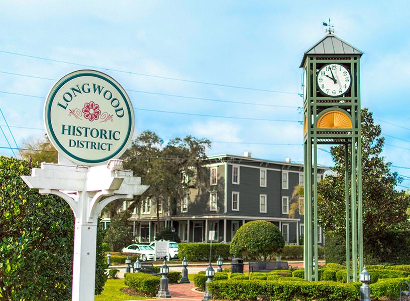 Longwood Historic District sign and clock tower near downtown