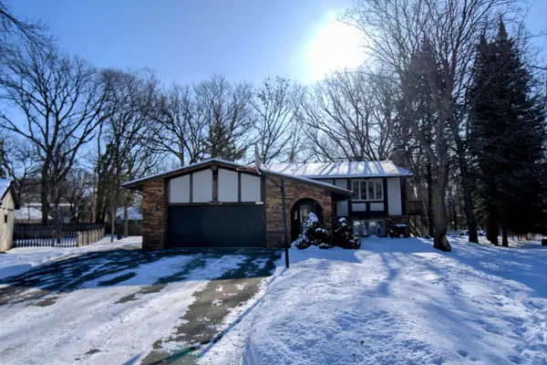 Charming 4BR/2BA Coon Rapids Home on Cul-De-Sac,Chuck Carstensen