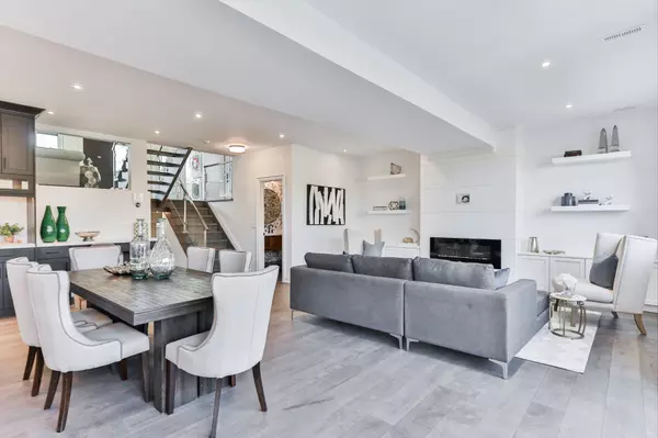 Luxury dining and living room setup for presenting real estate offers