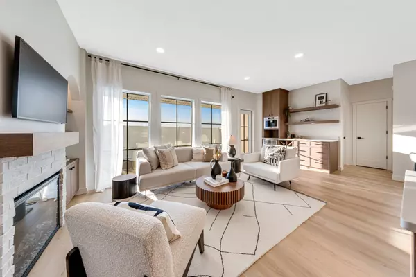 Spacious open-concept bungalow in Chateau, Saskatoon. High-end finishes, quartz countertops, and designer lighting.