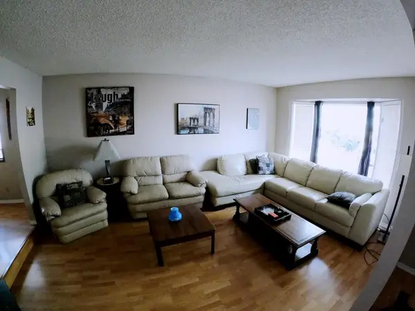 83 Woodford Cres SW, Calgary, AB T2W 4C6