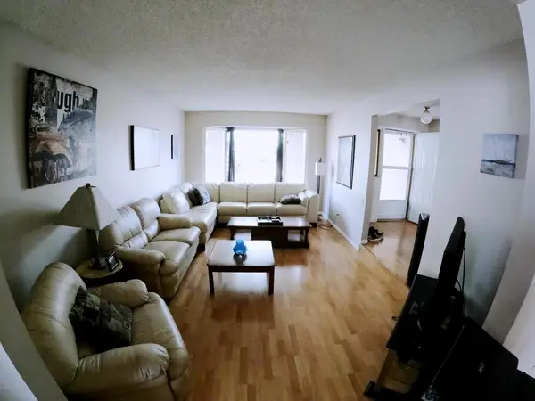 83 Woodford Cres SW, Calgary, AB T2W 4C6