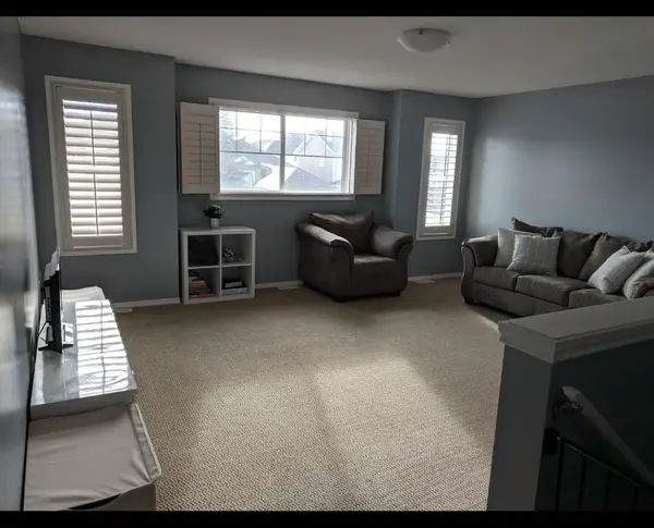 144 Cougar Ridge Dr SW, Calgary, AB T3H 4X6