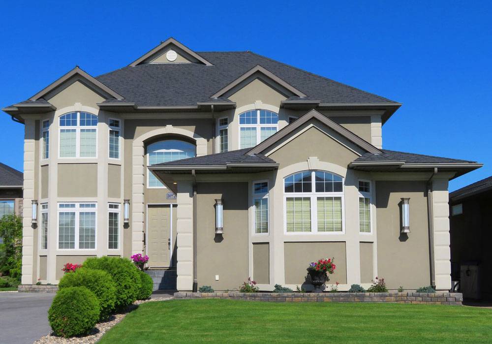 Middle class house with pleasant, green lawn. Ready for home appraisal.