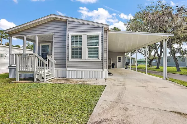 32 COCOS PLUMOSA DR, Eustis, FL 32726