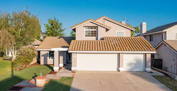 Two-story house in Murrieta with a backyard perfect for a pool and designed for multi-generational living