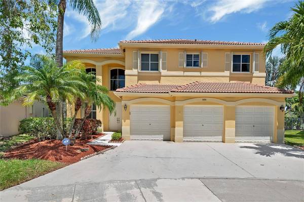 1684 Sparrow Ln, Weston, FL 33327