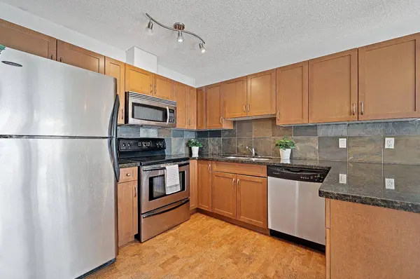 203 Village TER SW #8, Calgary, AB T3H 2L4