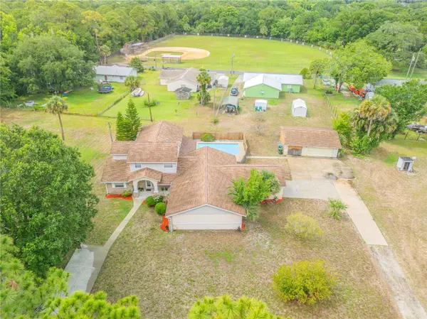 299 W HICKORY AVE, Oak Hill, FL 32759