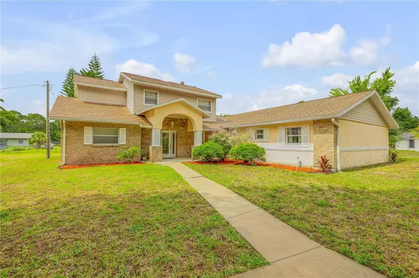 299 W HICKORY AVE, Oak Hill, FL 32759