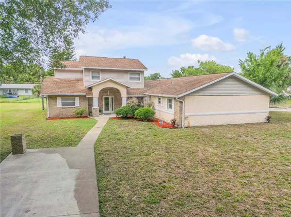 299 W HICKORY AVE, Oak Hill, FL 32759