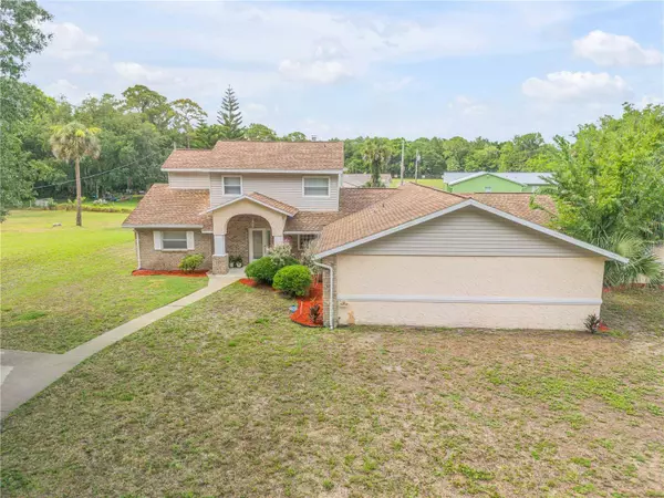 299 W HICKORY AVE, Oak Hill, FL 32759