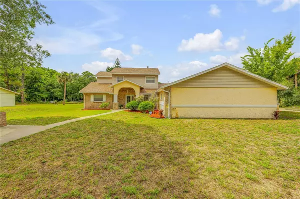 299 W HICKORY AVE, Oak Hill, FL 32759