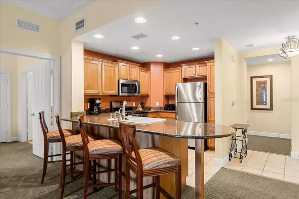 7703 HERITAGE CROSSING WAY #302, Reunion, FL 34747