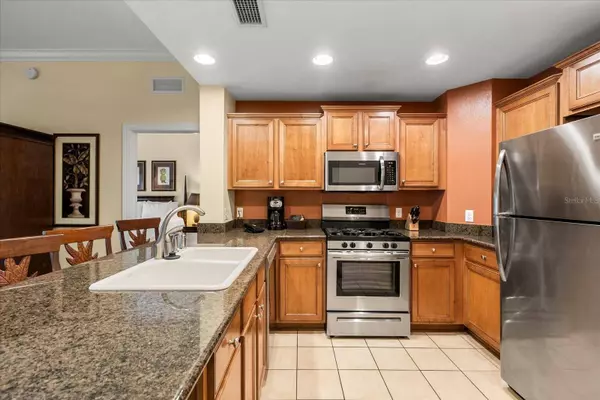 7703 HERITAGE CROSSING WAY #302, Reunion, FL 34747