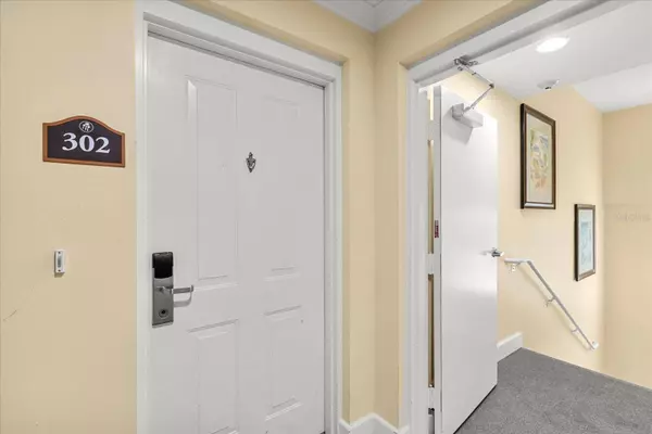 7703 HERITAGE CROSSING WAY #302, Reunion, FL 34747