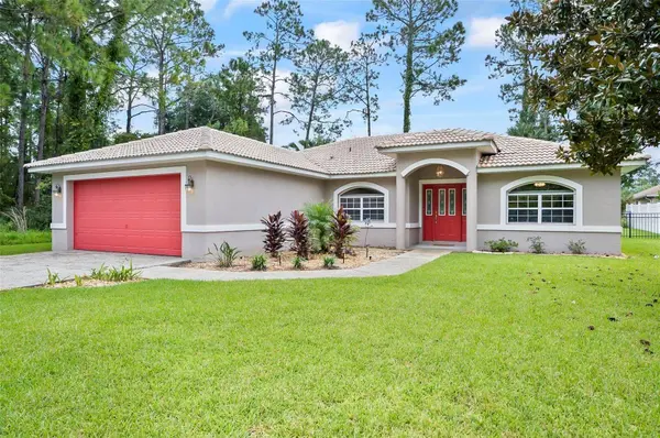 62 BIRD OF PARADISE DR, Palm Coast, FL 32137