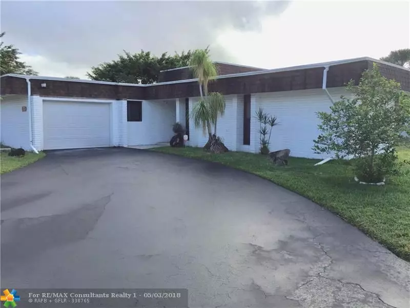 5702 S Travelers Palm Ln, Tamarac, FL 33319