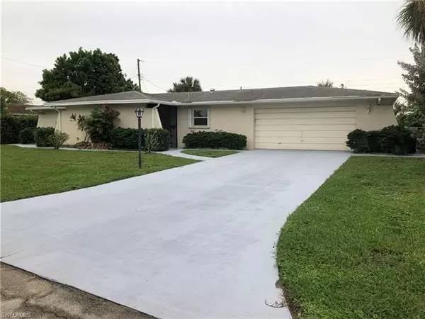 107 E Lake DR, Lehigh Acres, FL 33936